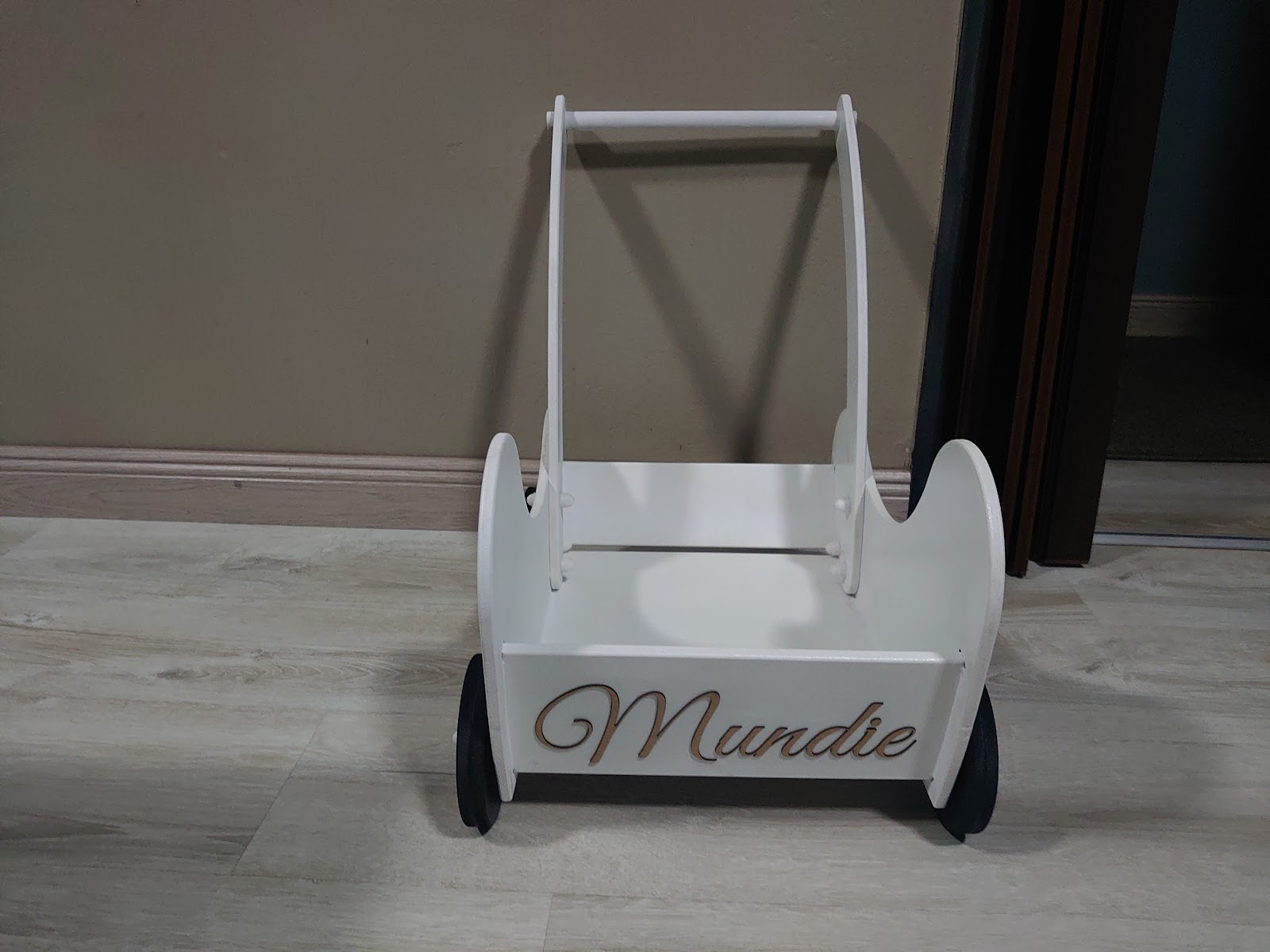 Personalized wooden toy pram with engraved name